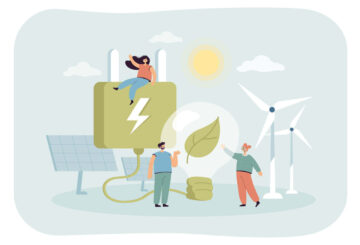 Tiny characters in village with windmills and solar panels e1766079076165